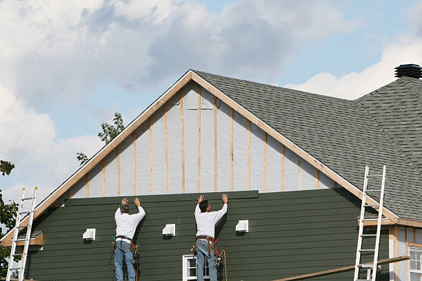 Professional Storm Damage Siding Repair technician working in Pleasant Hill, PA